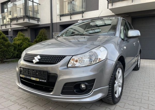 Suzuki SX4 cena 29990 przebieg: 200000, rok produkcji 2011 z Skawina małe 232